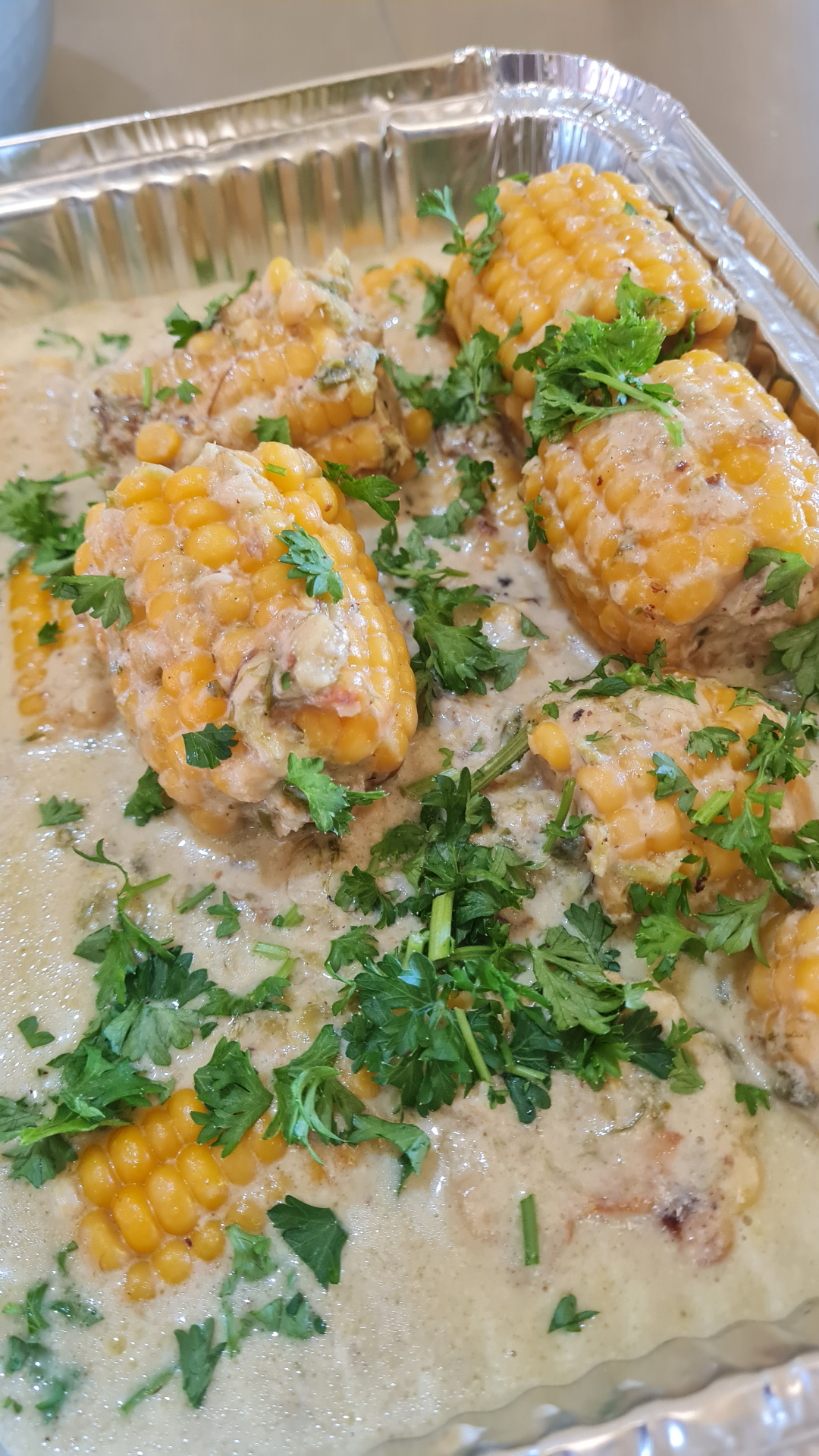 Creamed corn ribs garnished with cilantro