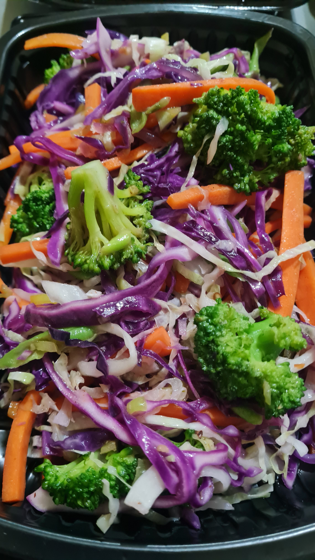 Rainbow slaw with purple cabbage, broccoli and carrots
